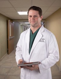 Dr. J. Ryan Mikus